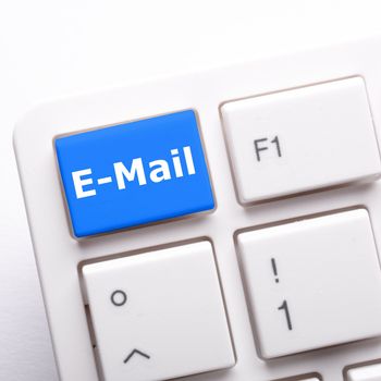 email e-mail or internet communication concept with key on keyboard