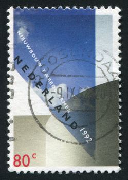 NETHERLANDS - CIRCA 1992: Stamp of the Netherlands with an abstract, colour background, circa 1992.
