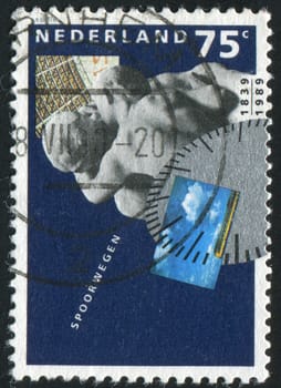NETHERLANDS - CIRCA 1989: Sculptural composition of kissing people, circa 1989.