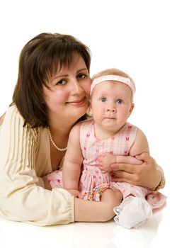 Mother with daughter sitting on chair isolated on white