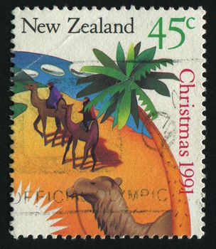 NEW ZEALAND - CIRCA 1991: Men on camels. Christmas, circa 1991.
