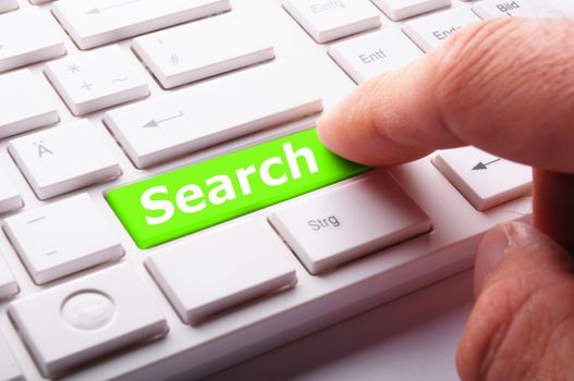 internet search engine key showing information hunt concept