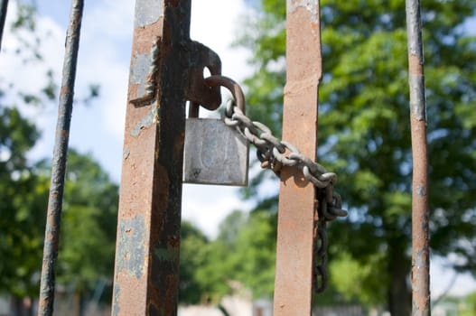 High resolution image. The old lock hanging on doors.