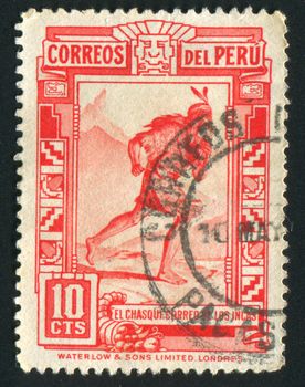 PERU - CIRCA 1951: The Indian runs in mountains, circa 1951.