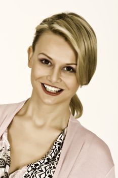 Portrait of a blond beauty with beautiful teeth