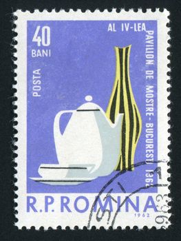 ROMANIA - CIRCA 1962: The ceramic ware is on a table, circa 1962.