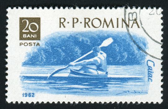 ROMANIA -CIRCA 1962: Sports racing on rowing on a kayak, circa 1962.