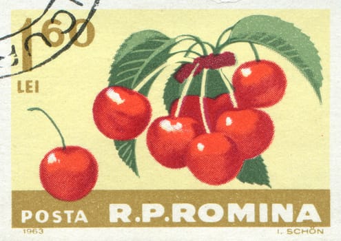 ROMANIA - CIRCA 1963: The cherries hangs on a branch, circa 1963.