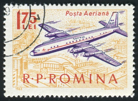 ROMANIA - CIRCA 1963: The plane flies over a city, circa 1963.
