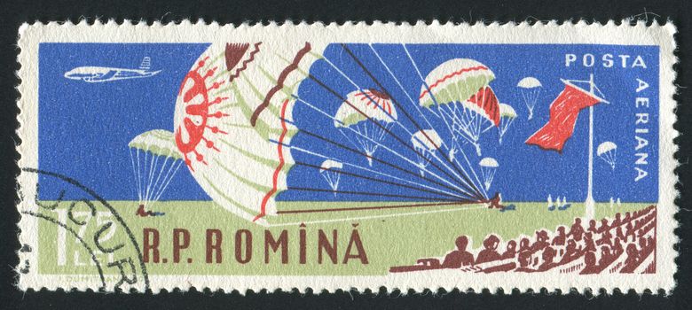 ROMANIA - CIRCA 1960: Parachutes at aviation sports meet, circa 1960.