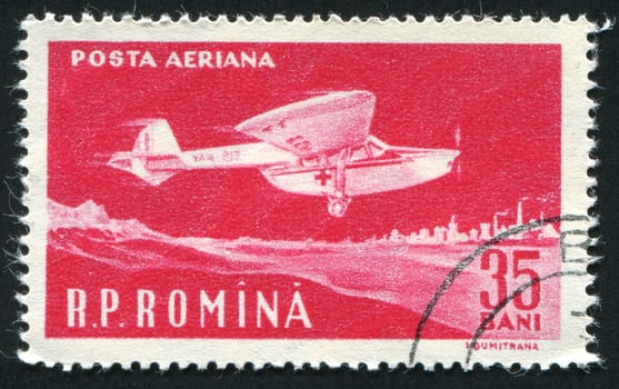 ROMANIA - CIRCA 1960: The flying plane an air mail symbol, circa 1960.