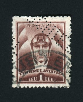 ROMANIA - CIRCA 1936: Head of the pilot in a helmet, circa 1936.