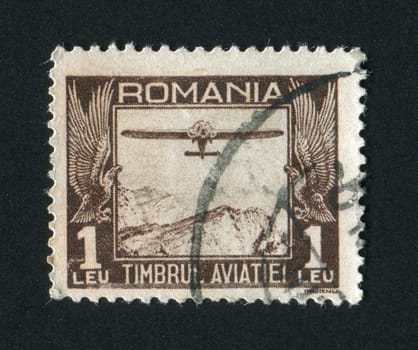ROMANIA - CIRCA 1931: The flying plane an air mail symbol, circa 1931.