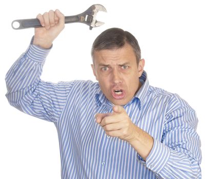 The aggressive man with a wrench in a hand on a white background