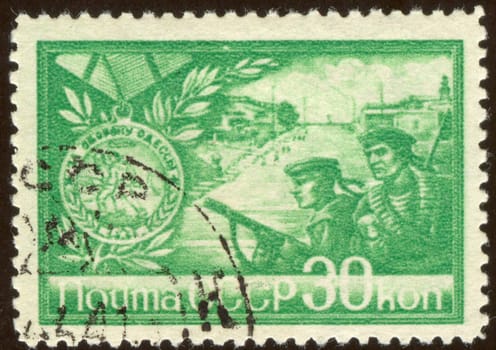 The scanned stamp. The Soviet stamp. Soldiers are at war with the enemy.