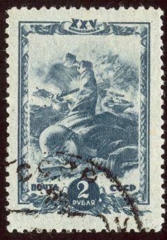 The scanned stamp. The Soviet stamp. The soldier throws a grenade.