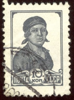 The scanned stamp. The Soviet stamp. The woman working at factory.