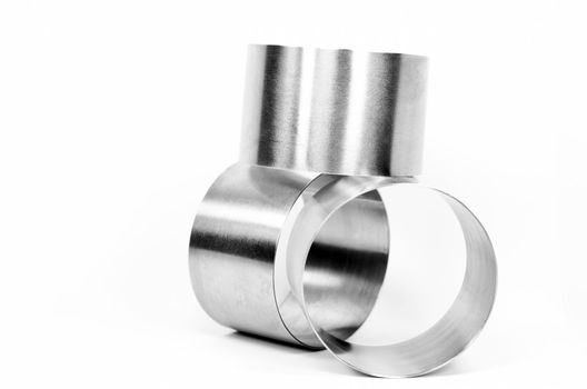 three metal cylinder on white background