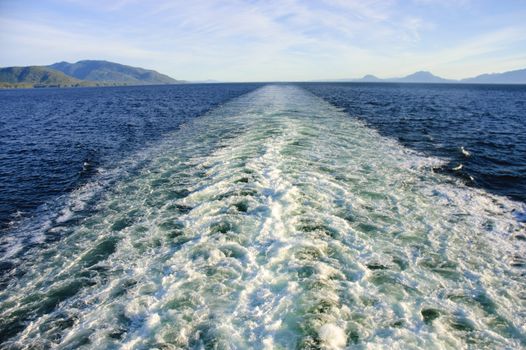 wake of a cruise ship on the inland passge heading south in Alaska