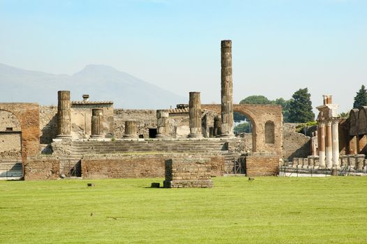 Ancient roman ruins in the destroyed city of Pompeii