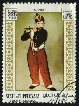 UPPER YAFA - CIRCA 1967:  Ancient portrait of the boy with a flute, circa 1967.