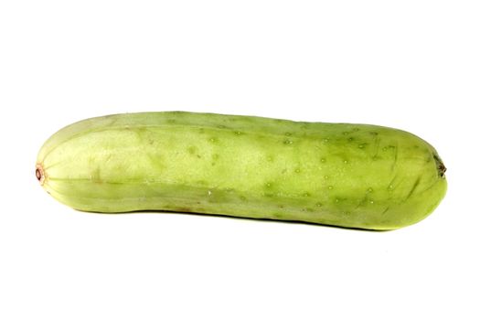 A fresh green cucumber, isolated on white studio background.