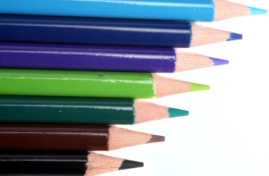 A metaphorical image of a team of colorful pencils depicting diversity.