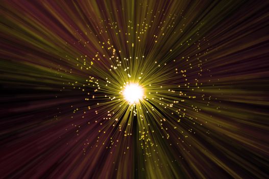The ends of many illuminated golden fibre optic strands emitting magenta and golden light blur effect from the centre against a dark background.
