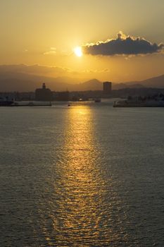 Early morning sunrise reflecting from the mediterranean in the harbor at Athens, Greece 