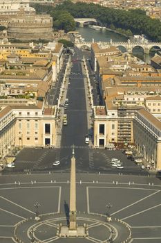 View from the top of St. Peters Basilica in ROme looking down via Vaticano towards atello St. Angelo and the Ponte St. Angelo, the river Tevere (Tiber), with the Quarinale, and the Monument to Vittorio Emmanuale II also in sight to the right.