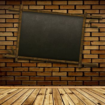 old bamboo blackboard on the brick wall