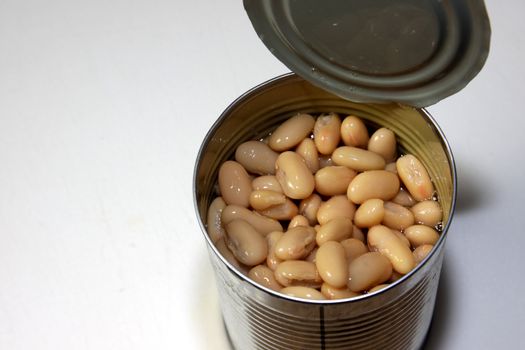 A can of White Kidney Beans, on a white background.
