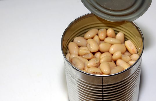 A can of White Kidney Beans, on a white background.