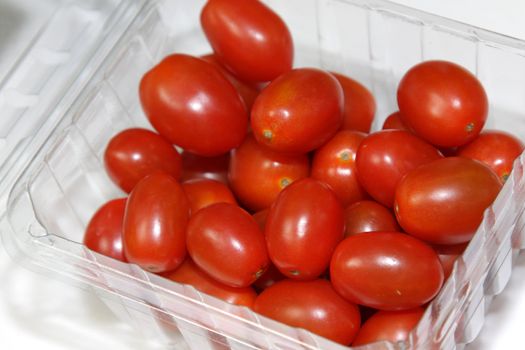 A package of red cherry tomatoes.