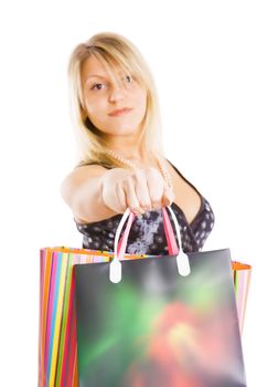 attractive smiling girl with the packages on a white background
