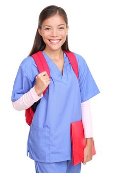 Medical student. Woman nurse or female medical student smiling with backpack and scrubs isolated on white background.