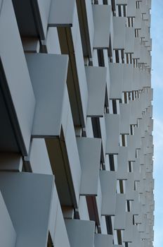 View on balconies of huge apartment building from the 70ths