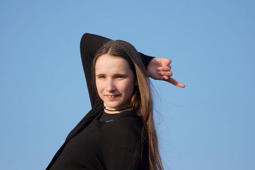 Portrait of a girl pointing with her finger