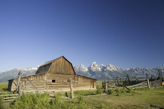 Old Mormon barn in Wyoming near the Tetons at sunrise