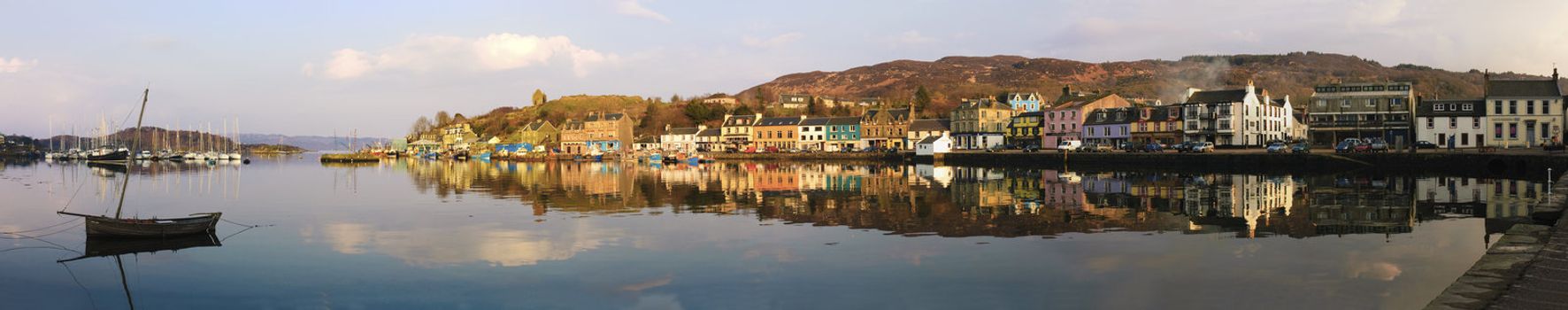 Panorama of Loch Fyne, Bruce's castle and Tarbert Harbor in Scotland at sunset