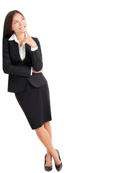 Businesswoman thinking leaning on wall looking up at copy space. Young mixed race Caucasian Asian professional woman isolated on white background