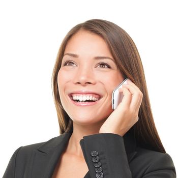 Businesswoman talking on phone. Businesswoman in suit smiling isolated on white background. Mixed-race Asian Caucasian female model.