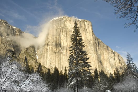 Wintery scene of "El Capitan" one of the granite rock formations in the Yosemite National Park in California that make up the Sierra Nevada's mountain range.