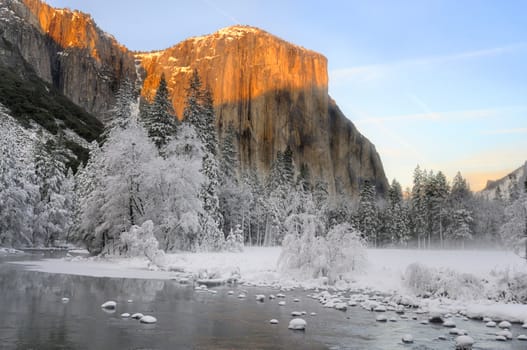Sunset on the granite peaks in Yosemite valley above the Merced river