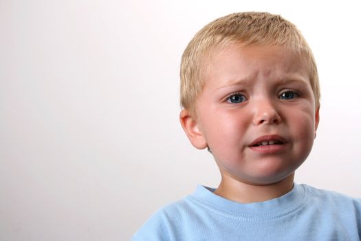 Beuatiful Blond toddler with big blue eyes