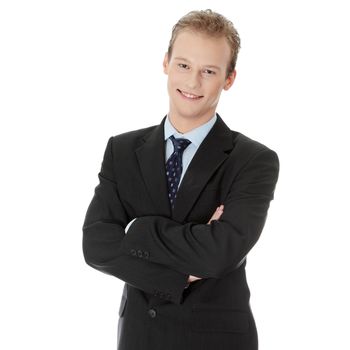 Happy young businessman standing, isoalted on white background