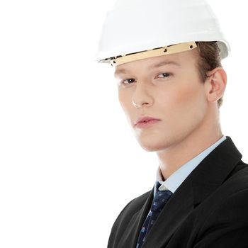 Young engineer in helmet, isolated over white