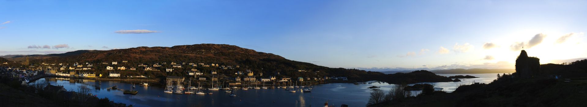 Panorama of Loch Fyne, Bruce's castle and Tarbert Harbor in Scotland at sunrise