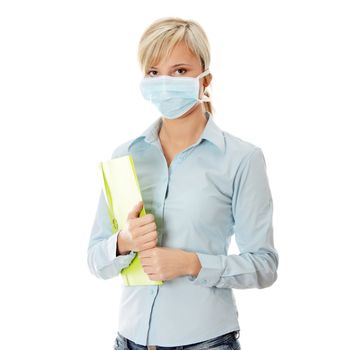 Young caucasian student woman with mask on her face. She is defending her self from viruses. Isolated on white