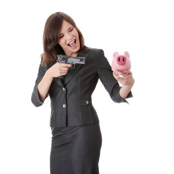 Businesswoman with gun pointing at piggy bank isolated on white